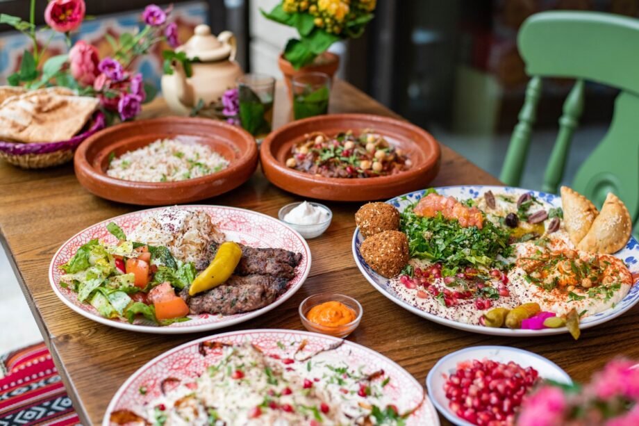 Outside terrace of Comptoir Libanais featuring tables and chairs on Kingston riverside