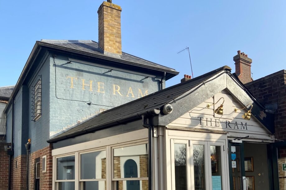 Photograph of the Ram garden with people using tables and chairs
